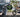 Split image showing a stressed driver stuck in urban traffic versus a smiling commuter riding a Wildeway e-bike along a sunny bike path.